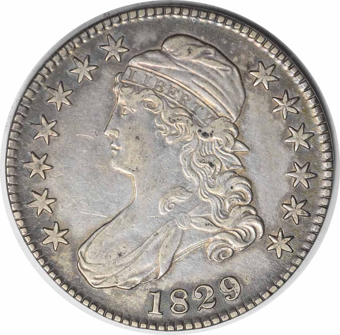 Half Dollar 1829 Bust AU Uncertified: Half Dollar 1829 Bust AU Uncertified The 1829 Bust Half Dollar features a distinctive design by John Reich, with its 32.50 millimeter diameter and lettered edge reading "FIFTY CENTS OR HALF A DOLLAR".