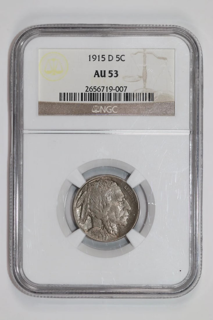 AU53 1915-D BUFFALO NICKEL: AU53 1915-D BUFFALO NICKEL AU53 1915-D BUFFALO NICKEL is a 1915-D Buffalo Nickel graded AU 53 by the Numismatic Guaranty Corporation (NGC). This coin features a unique 1915-D mint mark, indicating it 