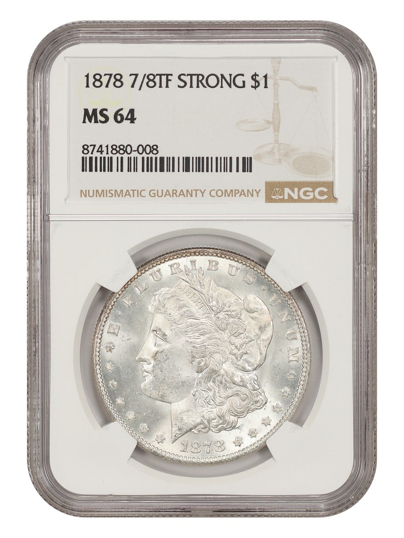 1878 7/ 8TF $1 NGC MS64 (Strong) - Morgan Dollar - Desirable Variety: 1878 7/ 8TF $1 NGC MS64 (Strong) - Morgan Dollar - Desirable Variety The 1878 7/8TF $1 NGC MS64 (Strong) Morgan Dollar boasts a strong strike, with the details of Liberty's face and the reverse's eagl