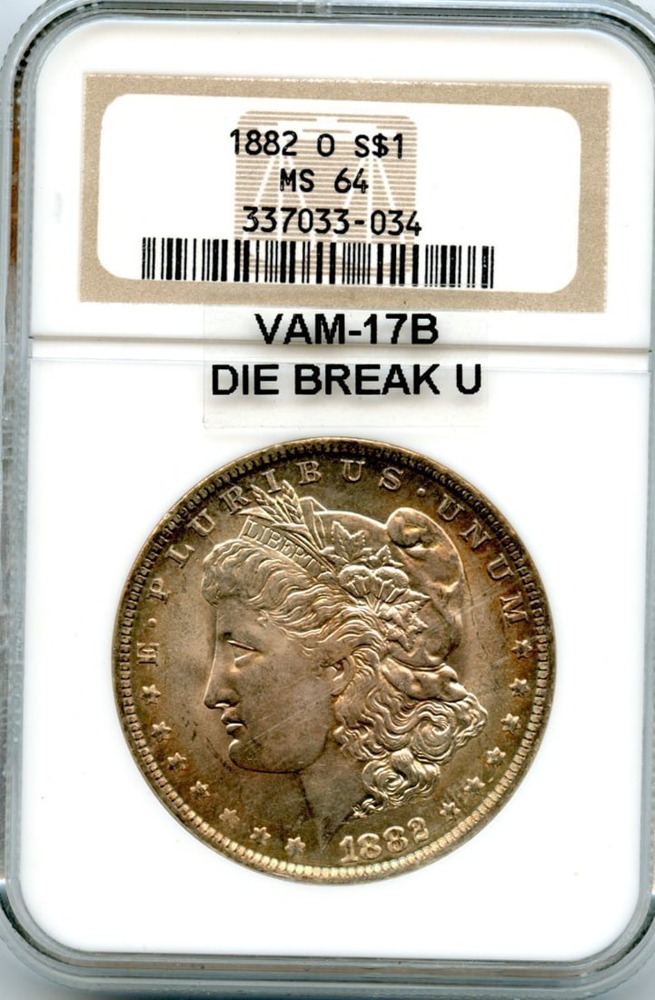 C6654- 1882-O VAM-17B DIE BREAK U MORGAN DOLLAR NGC MS64: C6654- 1882-O VAM-17B DIE BREAK U MORGAN DOLLAR NGC MS64 The 1882-O VAM-17B Die Break U Morgan Dollar is a highly detailed and unique specimen, boasting a striking die break that adds to its visual ap