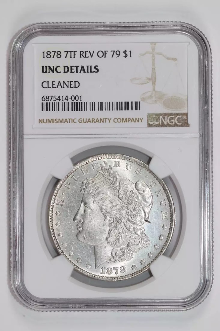 1878 7TF R79 MORGAN DOLLAR NGC UNC DETAILS: 1878 7TF R79 MORGAN DOLLAR NGC UNC DETAILS 1878 7TF R79 MORGAN DOLLAR NGC UNC DETAILS - A rare and highly detailed 1878 Morgan Dollar, certified by the Numismatic Guaranty Corporation (NGC) with UNC (