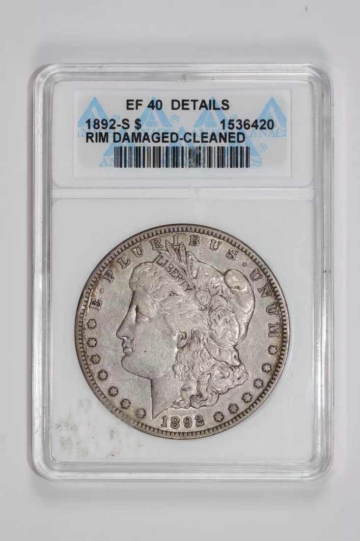 MORGAN DOLLAR 1892-S ANACS XF40: MORGAN DOLLAR 1892-S ANACS XF40 The Morgan Dollar 1892-S is a circulated coin with a notable grade of XF 40, certified by ANACS. This coin bears the signature of its designer, George T. Morgan, and is