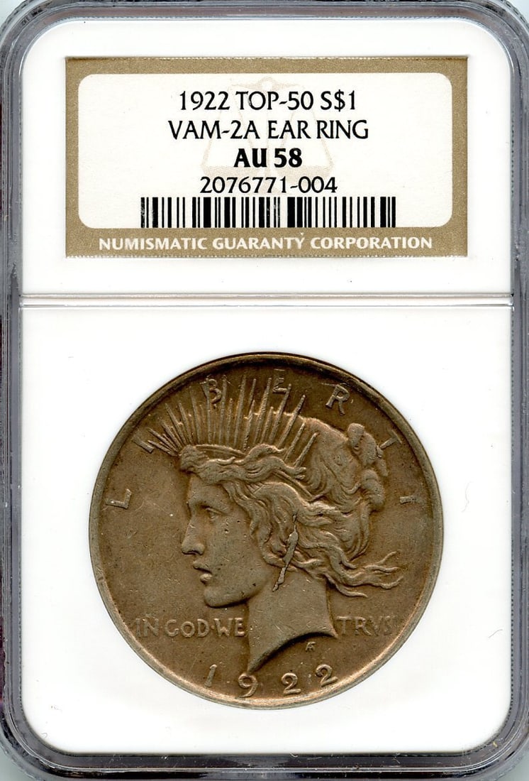 PEACE DOLLAR 50 NGC AU58 1922 VAM-2A EAR RING TOP: PEACE DOLLAR 50 NGC AU58 1922 VAM-2A EAR RING TOP The 1922 Peace Dollar, graded AU58 by the Numismatic Guaranty Corporation (NGC), boasts a striking design featuring a majestic eagle and the iconic Li