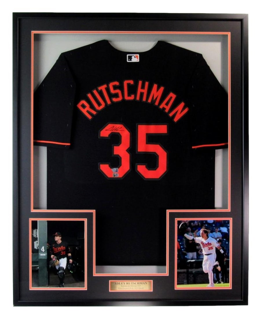 Adley Rutschman Autographed Black Baseball Jersey Orioles Framed Fanatics 185303: Adley Rutschman Autographed Black Baseball Jersey Orioles Framed Fanatics 185303 Signed by Adley Rutschman, this black baseball jersey is officially framed by Fanatics, featuring a unique and collecti