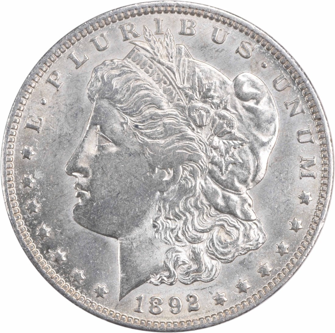 Uncertified AU Choice 1892 Morgan Dollar Silver: Uncertified AU Choice 1892 Morgan Dollar Silver The 1892 Morgan Dollar Silver is a Circulated coin with a rich history, featuring a George T. Morgan design and a reeded edge. Made from 90% silver and 