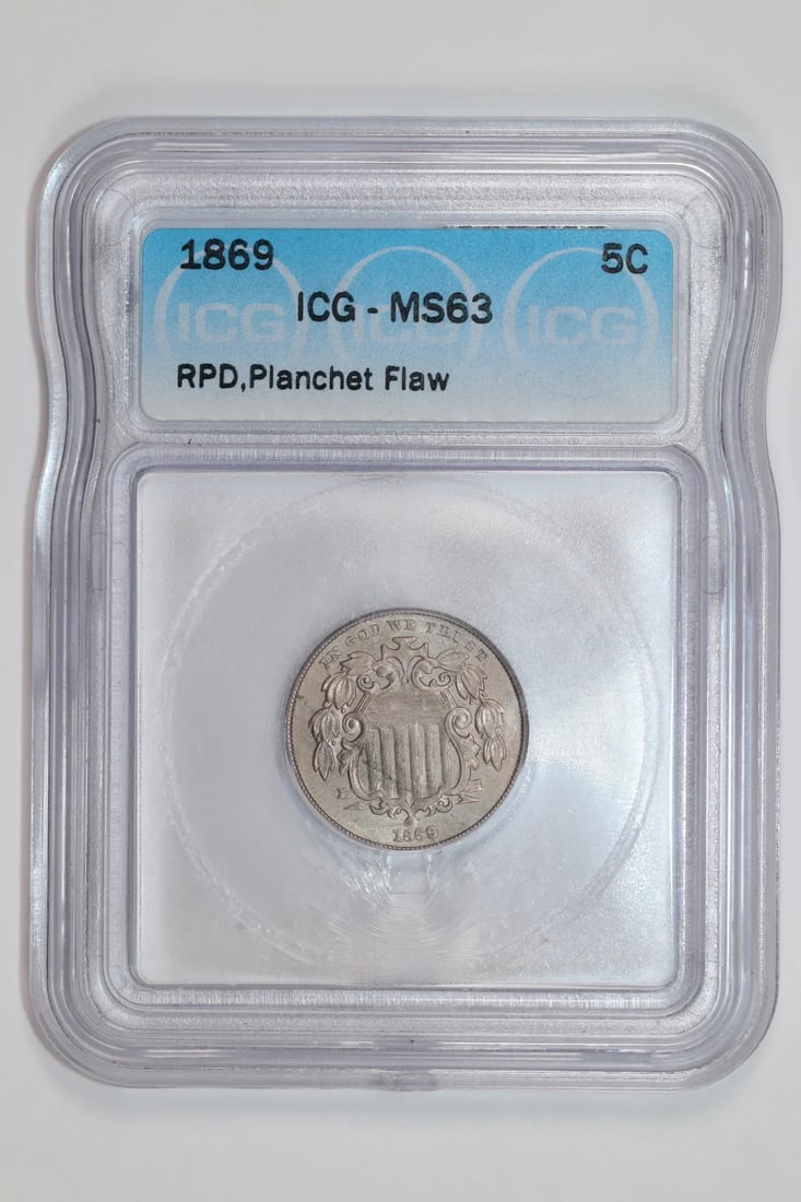 Shield nickel ICG MS63: Shield nickel ICG MS63 Shield nickel ICG MS63 is an uncirculated 1869 coin graded MS63 by the International Coin Guild (ICG). Its nickel composition and circulated date make it a unique piece of Ameri