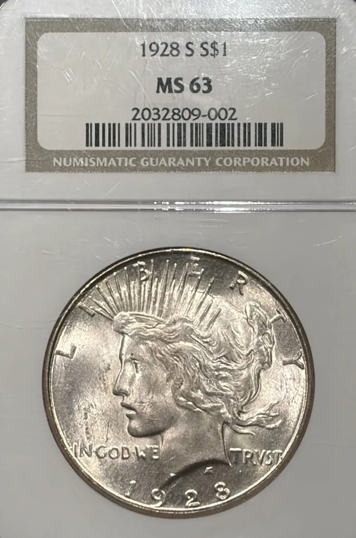Peace Dollar 1928 S NGC MS63: Peace Dollar 1928 S NGC MS63 The 1928 Peace Dollar, certified MS63 by the Numismatic Guaranty Corporation (NGC), is a highly detailed and well-preserved silver coin. This San Francisco minted dollar