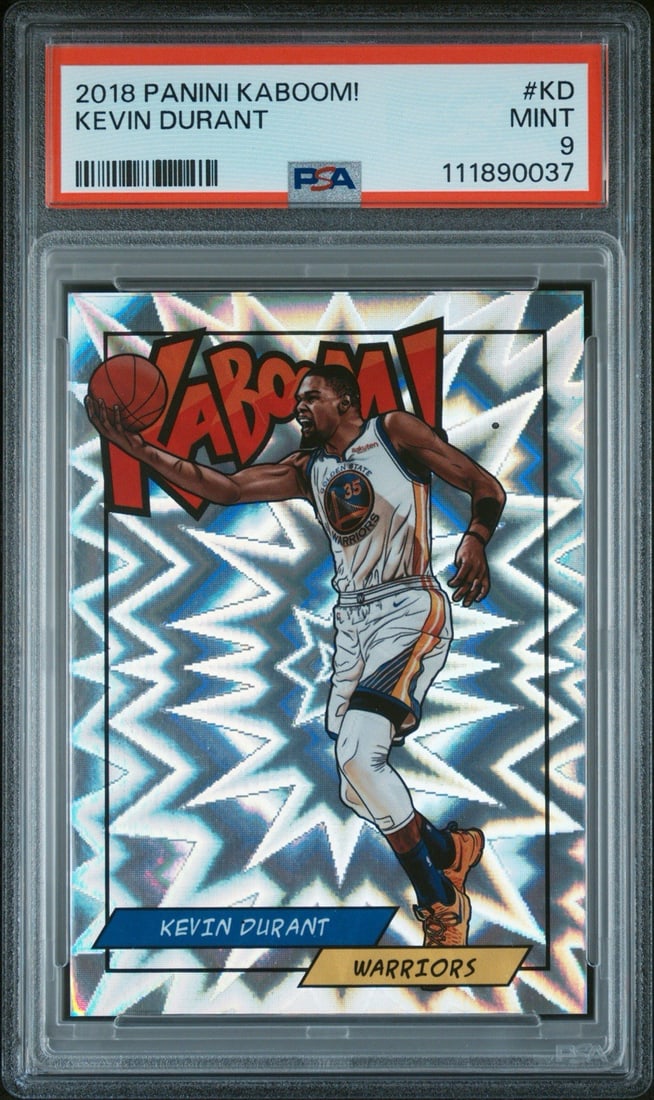 KEVIN DURANT #KD PSA 9 KABOOM 2018 PANINI: KEVIN DURANT #KD PSA 9 KABOOM 2018 PANINI PSA 9 graded Kaboom insert of Kevin Durant, featuring his iconic #KD, from the 2018 Panini Rewards set, showcases the NBA star's impressive skills on the cour