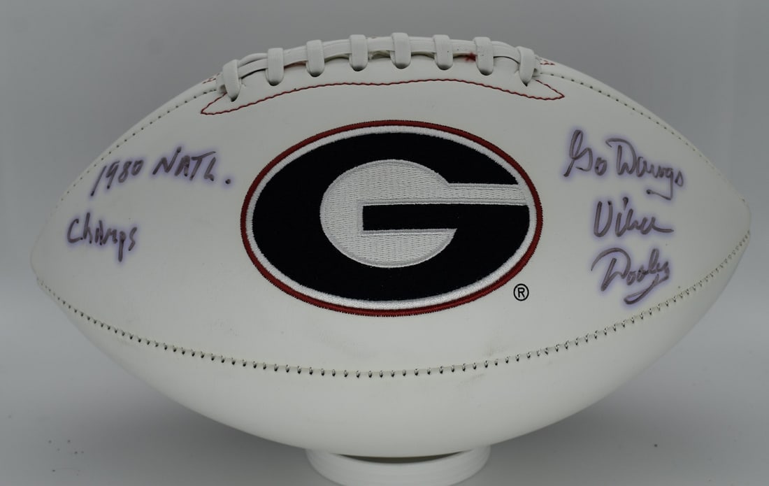 Vince Dooley Signed/ Autographed Georgia Bulldogs Logo Football JSA 212319: Vince Dooley Signed/ Autographed Georgia Bulldogs Logo Football JSA 212319 Authentic Georgia Bulldogs logo football signed by Vince Dooley, a legendary coach, bears a JSA (James Spence Authentication)