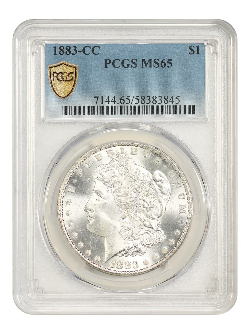 1883-CC $1 PCGS MS65 - Morgan Dollar: 1883-CC $1 PCGS MS65 - Morgan Dollar The 1883-CC $1 Morgan Dollar is a highly graded MS65 coin, certified by PCGS, showcasing exceptional condition and detail. This uncirculated coin features the icon