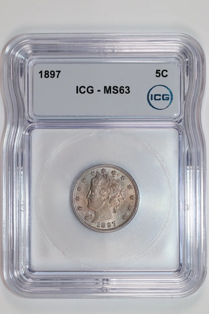 1897 LIBERTY V NICKEL ICG MS63: 1897 LIBERTY V NICKEL ICG MS63 The 1897 Liberty V Nickel ICG MS63 is a highly detailed and well-preserved example of this iconic coin, boasting a rich history and exceptional condition. Certified by t