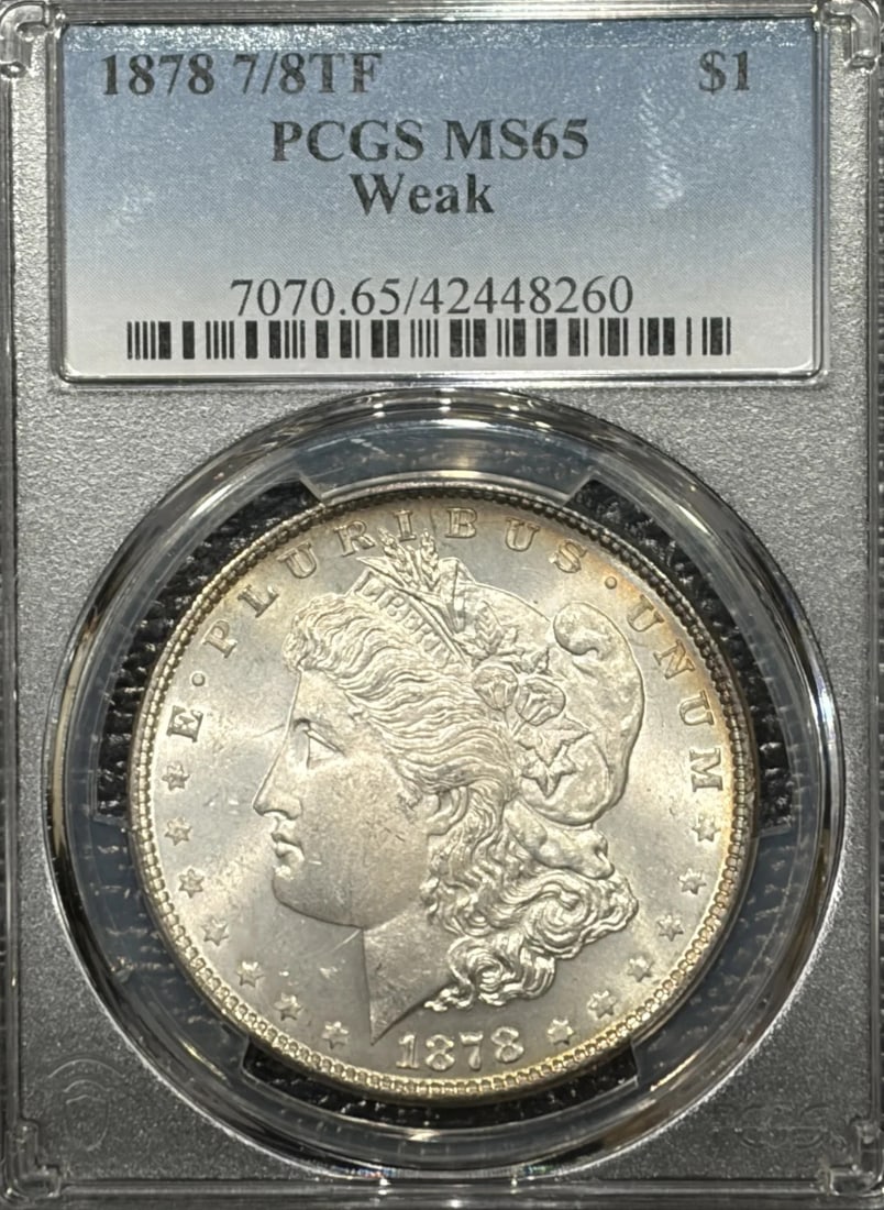 1878 7/ 8TF WEAK MORGAN DOLLAR PCGS MS65: 1878 7/ 8TF WEAK MORGAN DOLLAR PCGS MS65 Item Specifics: Certification: PCGS Composition: Silver Grade: MS 65 Year: 1878 Circulated/Uncirculated: Uncirculated Mint Location: Philadelphia Certification
