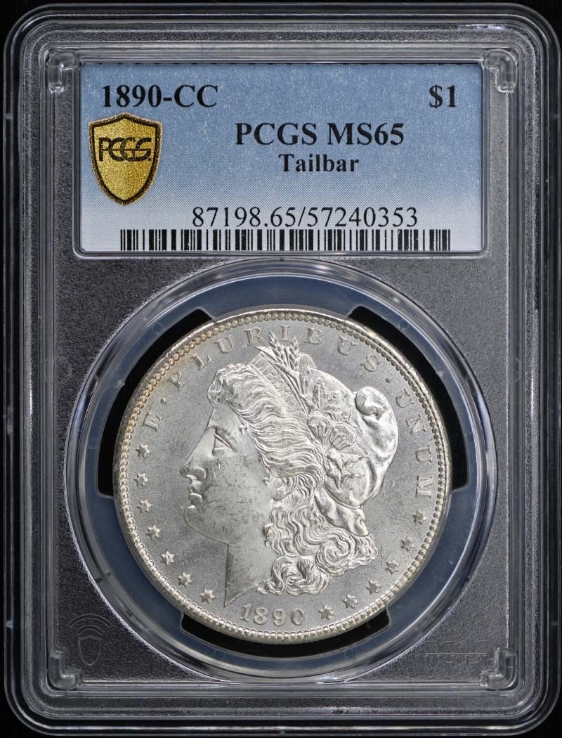 1890-CC $1 Tailbar Morgan Dollar PCGS MS65: 1890-CC $1 Tailbar Morgan Dollar PCGS MS65 The 1890-CC $1 Tailbar Morgan Dollar is a highly graded MS65 coin, certified by PCGS. This uncirculated coin features the iconic design of the Morgan Dollar,
