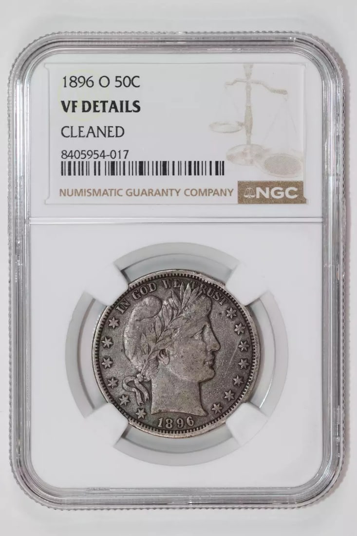 1896-O BARBER HALF DOLLAR NGC VF DETAILS - LOOKS ORIGINAL: 1896-O BARBER HALF DOLLAR NGC VF DETAILS - LOOKS ORIGINAL The 1896-O Barber Half Dollar is a rare and historic coin, certified by the Numismatic Guaranty Corporation (NGC) as VF Details. This coin fea
