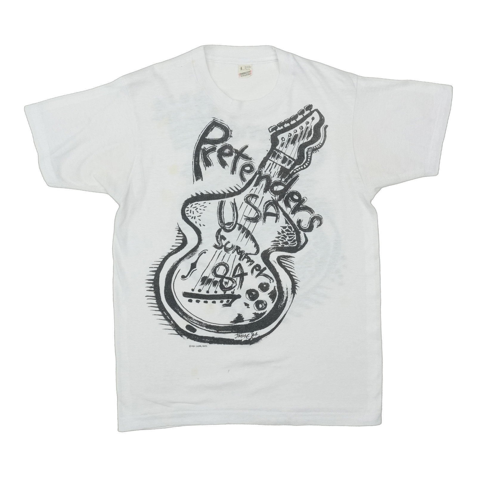 Pretenders 1984 USA Summer Tour Shirt: Pretenders 1984 USA Summer Tour Shirt Authentic 1984 Pretenders USA Summer Tour Shirt. This vintage tour tee features the iconic band's logo and design, a must-have for fans of the 80s new wave scene.