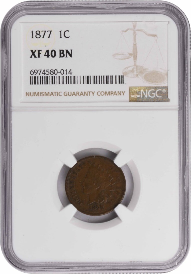 Indian Cent EF40BN NGC: Indian Cent EF40BN NGC EF40BN NGC certified Indian Cent, dated 1877, showcases a high level of detail and preservation, with its copper composition and circulated condition. The coin's small size and