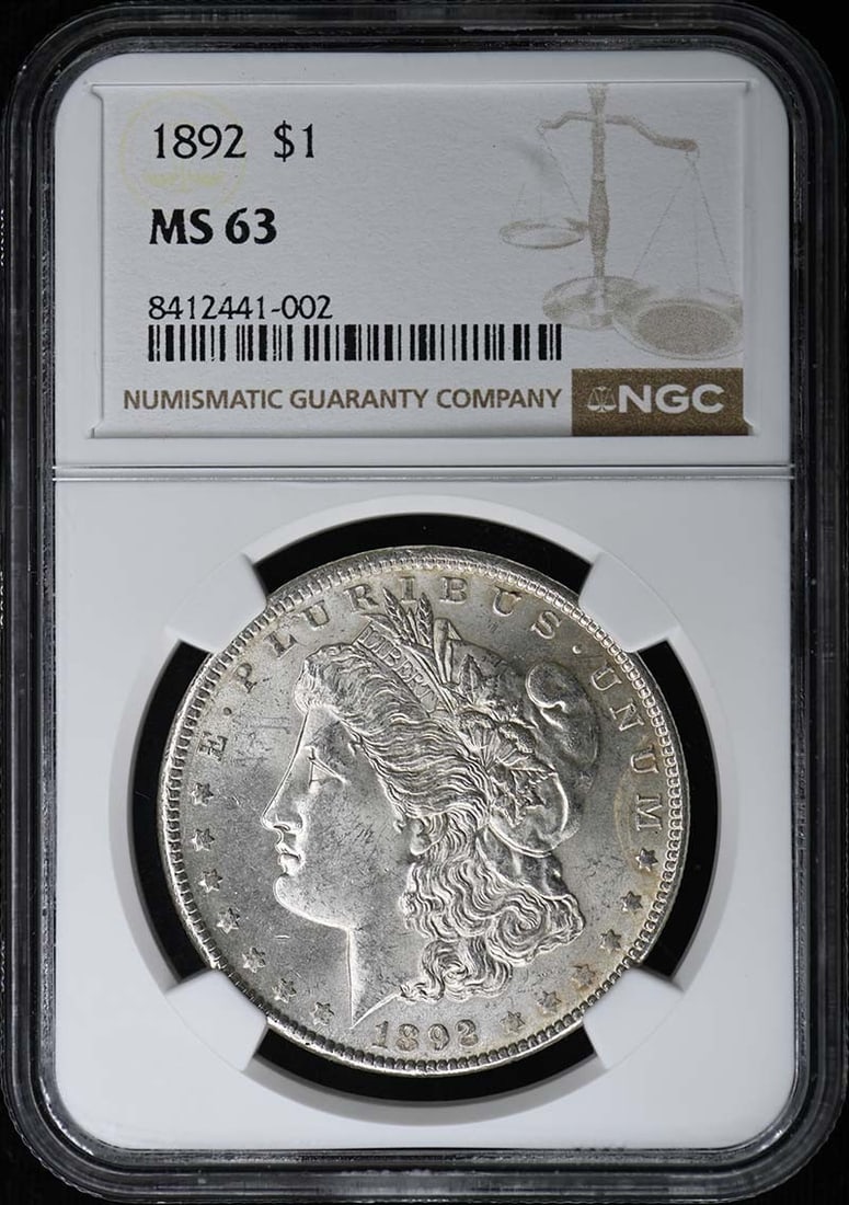 1892 Morgan Dollar S$1 NGC MS63: 1892 Morgan Dollar S$1 NGC MS63 The 1892 Morgan Dollar, graded MS63 by the Numismatic Guaranty Corporation (NGC), is a well-preserved example of this iconic coin. Certified as uncirculated, it showcas