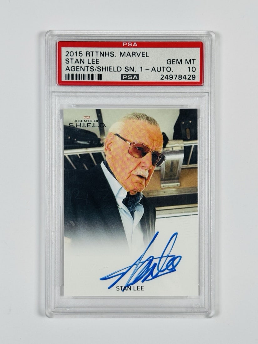 STAN LEE AUTO PSA 10 2015 MARVEL: STAN LEE AUTO PSA 10 2015 MARVEL Stan Lee's iconic 2015 Marvel card, graded PSA 10, is a rare and highly sought-after collectible. This standard-sized autographed card features the legendary Stan Lee,