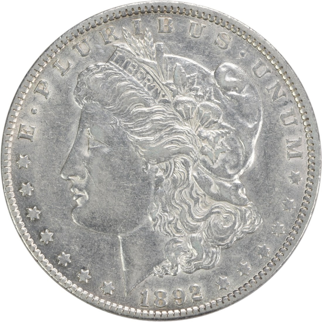 Morgan Silver Dollar AU Uncertified 1892: Morgan Silver Dollar AU Uncertified 1892 The 1892 Morgan Silver Dollar is a circulated coin with an attractive AU grade, featuring George T. Morgan's design and a reeded edge. Made of 90% silver and 1