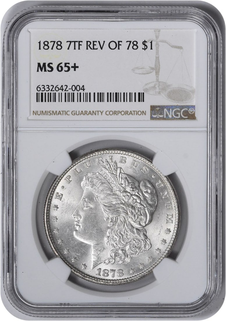Morgan Silver Dollar 7TF MS65+ NGC Reverse 1878: Morgan Silver Dollar 7TF MS65+ NGC Reverse 1878 The 1878 Morgan Silver Dollar is a highly detailed and precise coin, with a diameter of 38.10 millimeters and a weight of 26.73 grams. Certified by the 