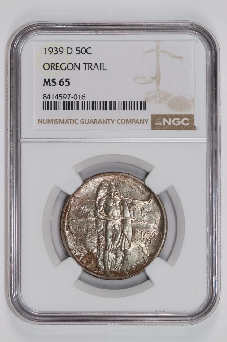 1939-D OREGON COMMEMORATIVE HALF DOLLAR NGC MS65: 1939-D OREGON COMMEMORATIVE HALF DOLLAR NGC MS65 The 1939-D Oregon Commemorative Half Dollar is a rare and highly detailed coin, certified by the Numismatic Guaranty Corporation (NGC) as MS 65. This u