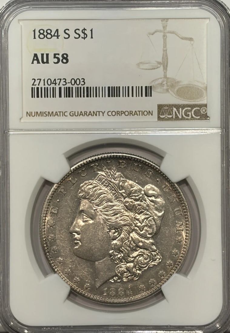 1884-S MORGAN DOLLAR NGC AU58: 1884-S MORGAN DOLLAR NGC AU58 The 1884-S Morgan Dollar is a highly sought-after coin, featuring a stunning silver finish and a rich history. Certified by the Numismatic Guaranty Corporation (NGC) with