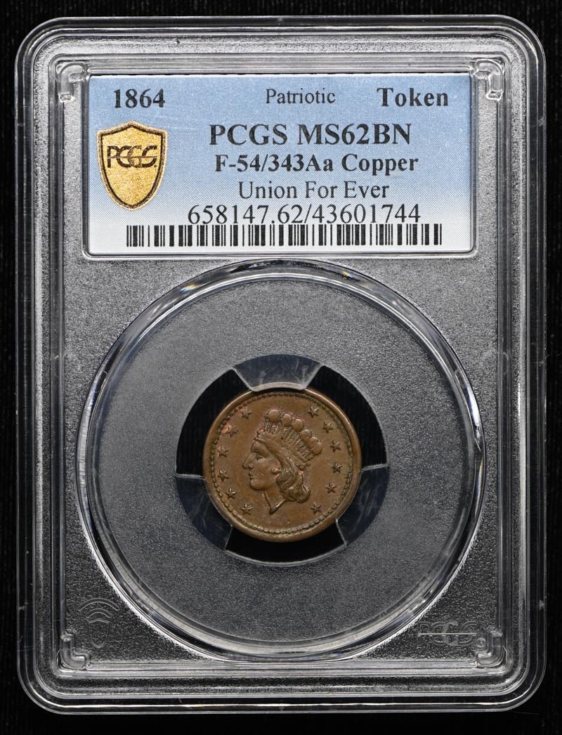 Copper PCGS MS62BN 1864 F-54 343Aa: Copper PCGS MS62BN 1864 F-54 343Aa The 1864 copper coin, certified MS62 by PCGS, boasts a beautiful bronze tone and a rich history, bearing a signature from the artist. This F-54 343Aa coin is a rare 