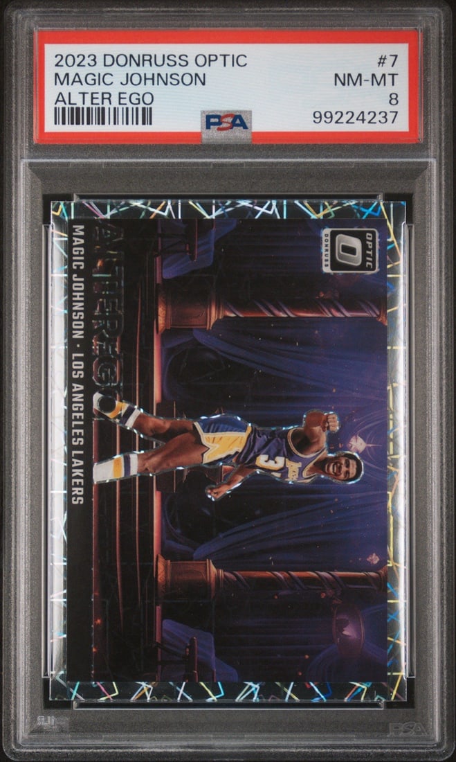2023 DONRUSS OPTIC MAGIC JOHNSON #7 ALTER EGO PSA 8: 2023 DONRUSS OPTIC MAGIC JOHNSON #7 ALTER EGO PSA 8 The 2023 Donruss Optic Magic Johnson #7 Alter Ego card features a vibrant Optic Autograph, showcasing the legendary basketball player's likeness. Gr
