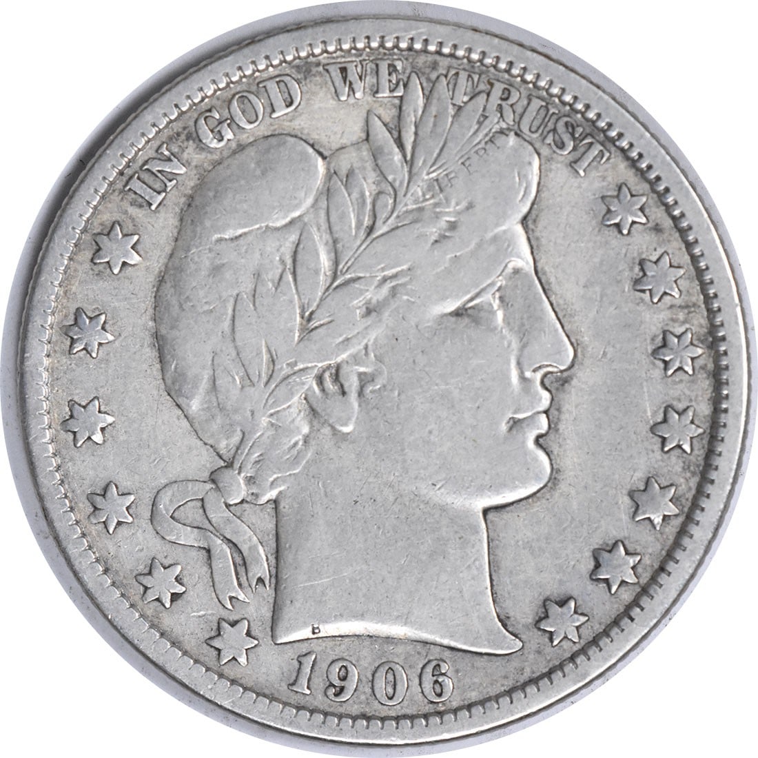 1906-D Barber Silver Half Dollar VF Uncertified: 1906-D Barber Silver Half Dollar VF Uncertified The 1906-D Barber Silver Half Dollar is a circulated coin with a strong silver composition, weighing in at 12.5 grams. This coin bears the iconic Barber