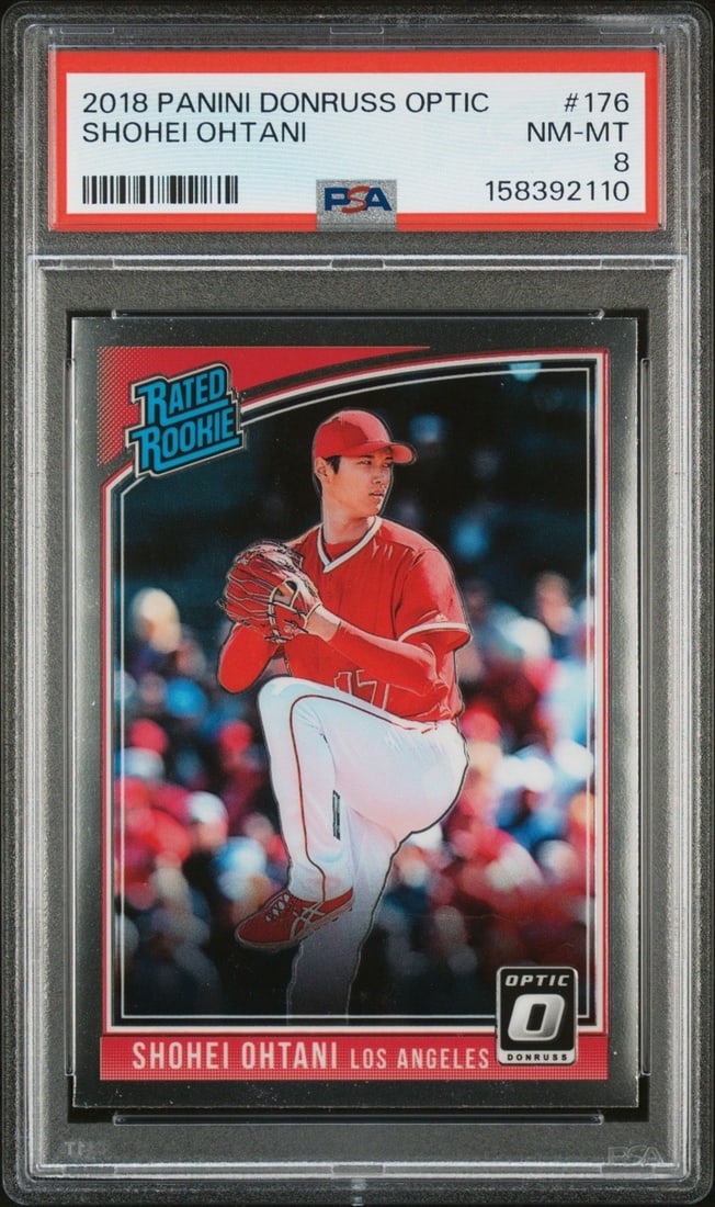2018 PANINI DONRUSS OPTIC SHOHEI OHTANI #176 PSA 8: 2018 PANINI DONRUSS OPTIC SHOHEI OHTANI #176 PSA 8 PSA 8 graded 2018 Panini Donruss Optic card featuring Shohei Ohtani at #176, a notable addition to any baseball collection. This card showcases Ohtan