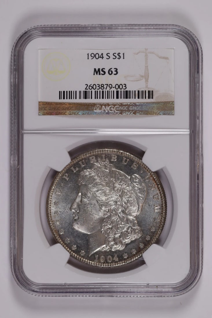 1904-S MORGAN DOLLAR NGC MS63 FLASHY PQ: 1904-S MORGAN DOLLAR NGC MS63 FLASHY PQ The 1904-S Morgan Dollar is a highly detailed and intricately designed coin, featuring George Washington on the obverse and an image of Lady Liberty on the reve