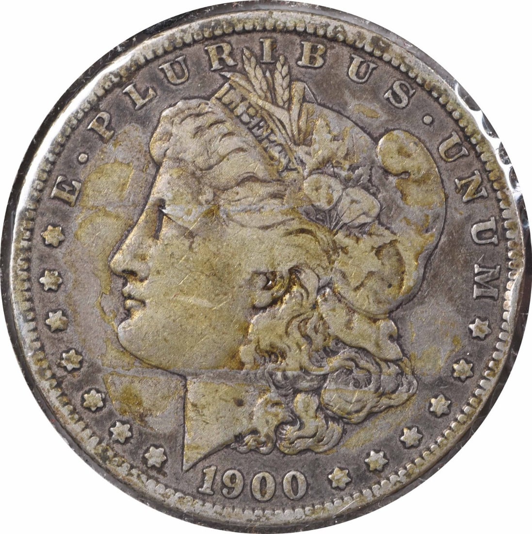 Morgan Silver Dollar 1900 CC F Uncertified: Morgan Silver Dollar 1900 CC F Uncertified The 1900 CC Morgan Silver Dollar is a circulated coin featuring a reeded edge and a distinctive mint mark. Made from 90% silver and 10% copper, this coin is 