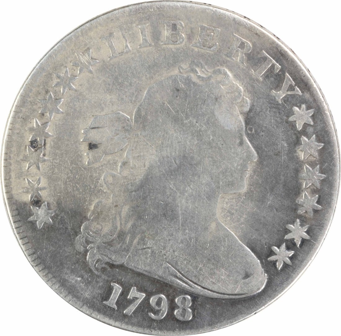 Uncertified Silver Dollar 1798 Bust: Uncertified Silver Dollar 1798 Bust This 1798 Bust Uncertified Silver Dollar is a rare and historic coin, featuring the iconic bust of Lady Liberty on its obverse. Made of silver, it was minted in
