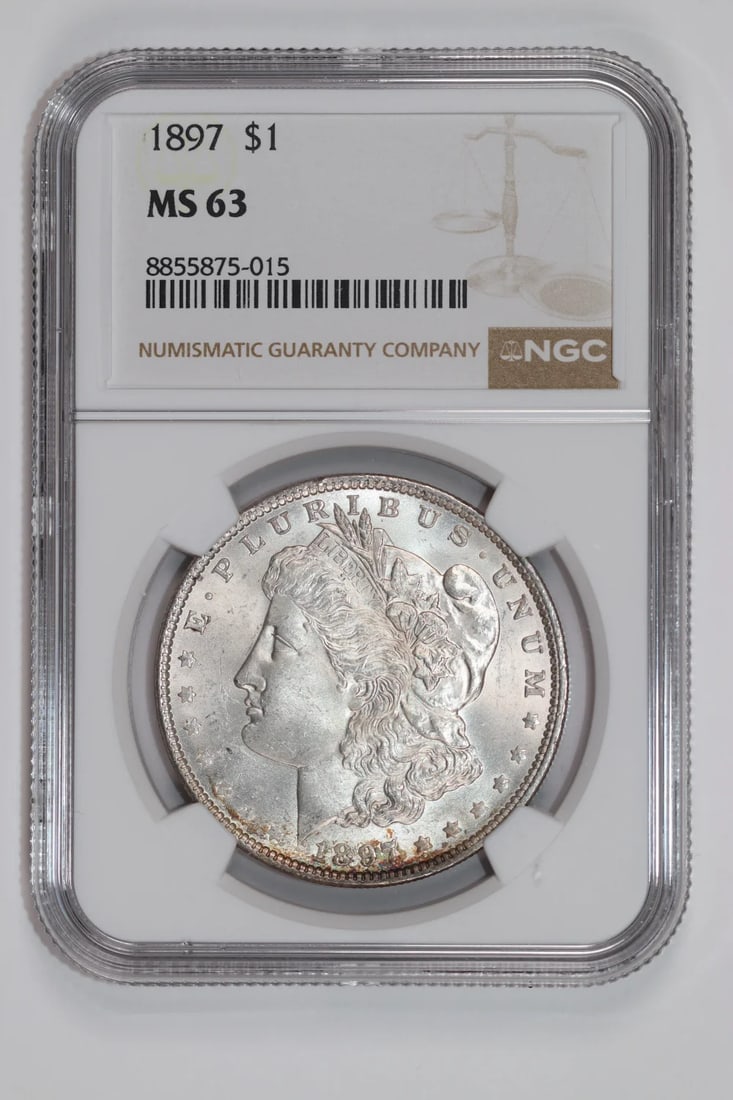 1897 MORGAN DOLLAR NGC MS63: 1897 MORGAN DOLLAR NGC MS63 The 1897 Morgan Dollar is a highly sought-after coin, featuring a stunning silver design with a grade of MS63 from the Numismatic Guaranty Corporation (NGC). This coin