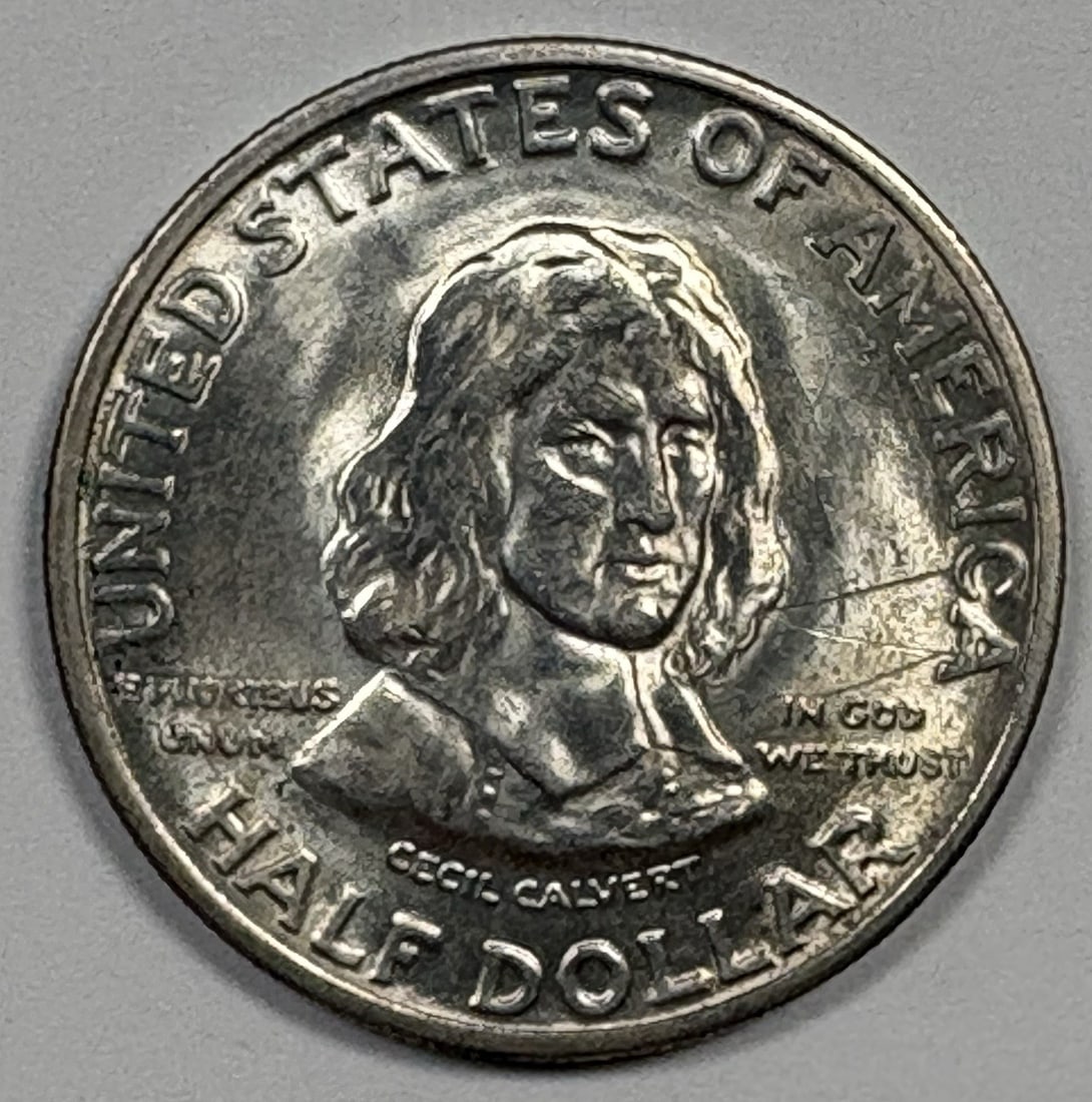 AU/ BU HALF DOLLAR COMMEMORATIVE MARYLAND 1934: AU/ BU HALF DOLLAR COMMEMORATIVE MARYLAND 1934 Item Specifics: Variety: Maryland Denomination: 50C Composition: Silver Year: 1934 Certification: NGC Product Disclaimer: Grades are third-party opinions