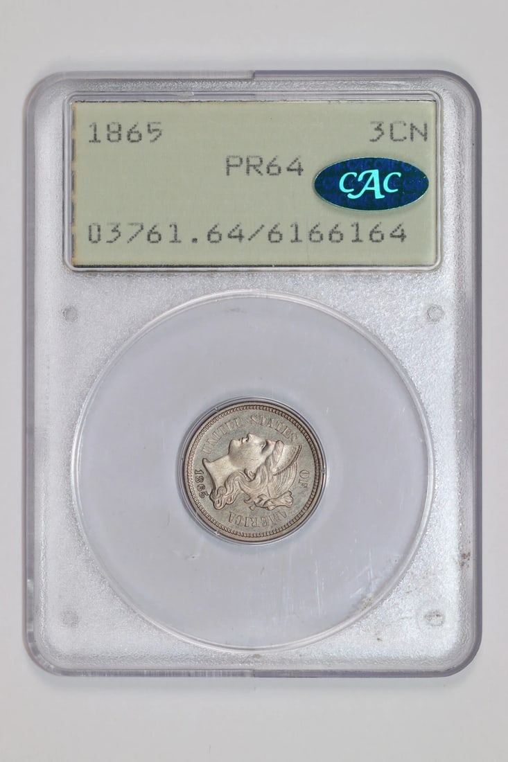 1865 PROOF THREE CENT NICKEL PCGS PR64 CAC RATTLER OGH PQ: 1865 PROOF THREE CENT NICKEL PCGS PR64 CAC RATTLER OGH PQ The 1865 Proof Three Cent Nickel is a rare and highly sought-after coin, graded MS 64 by PCGS and CAC, indicating exceptional condition and qu