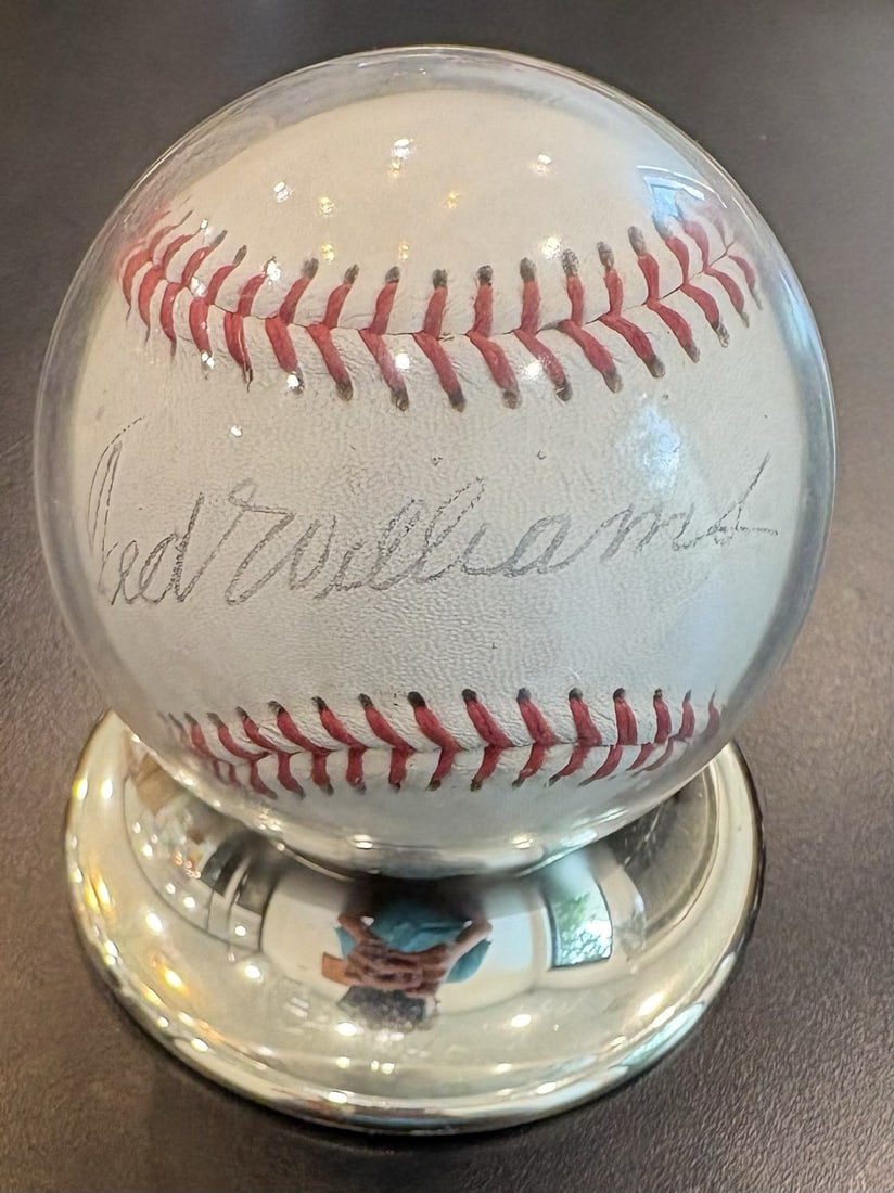 SIGNED BASEBALL TED WILLIAMS JSA LOA: SIGNED BASEBALL TED WILLIAMS JSA LOA Signed by baseball legend Ted Williams, this original baseball is a must-have for any serious collector. The James Spence Authentication (JSA) certification provid