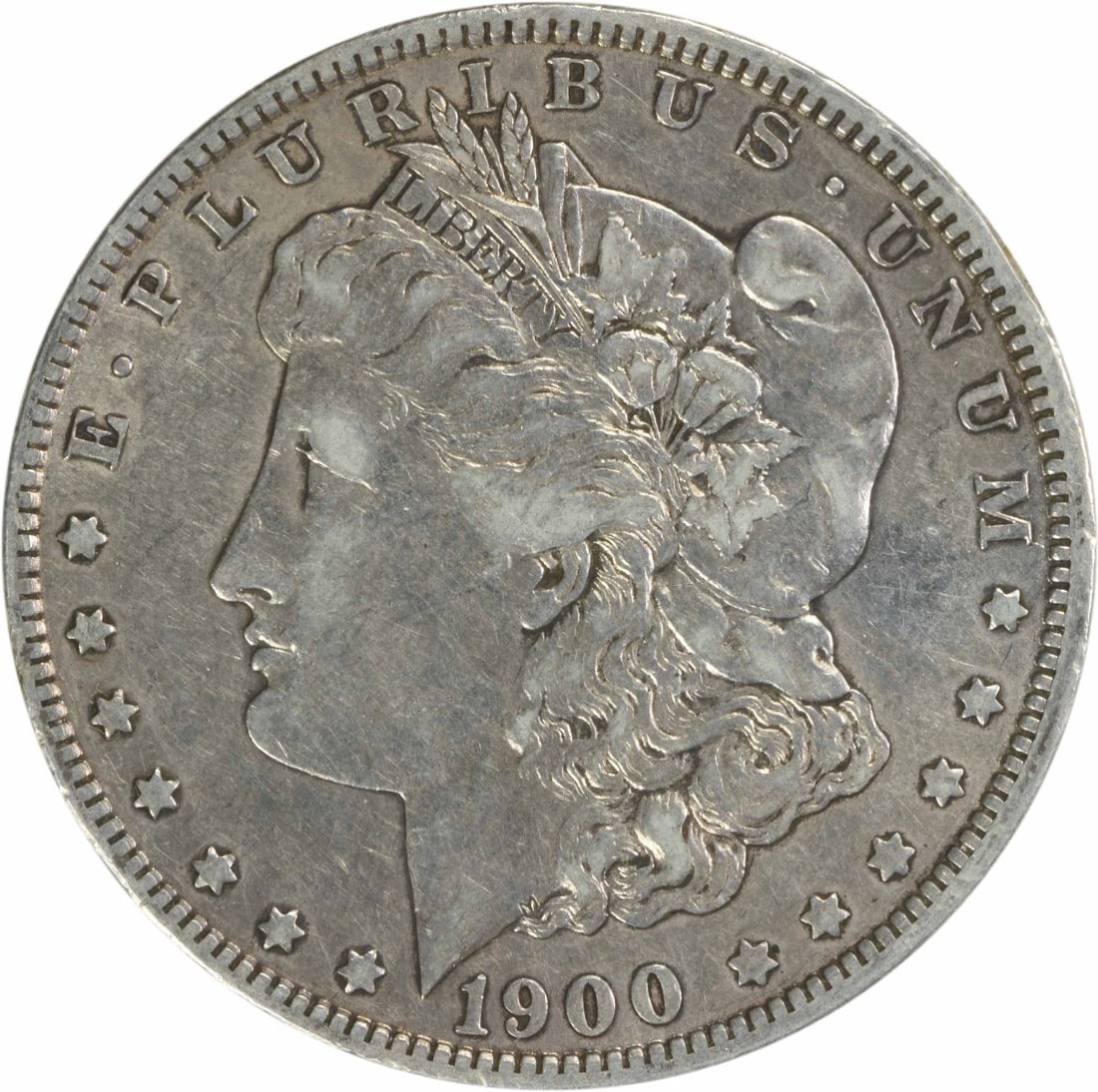 1900-O/ CC Morgan Silver Dollar VF Uncertified: 1900-O/ CC Morgan Silver Dollar VF Uncertified The 1900-O/CC Morgan Silver Dollar is a beautifully crafted coin with a rich history, featuring a reeded edge and a distinctive mint mark. Made from 90% 