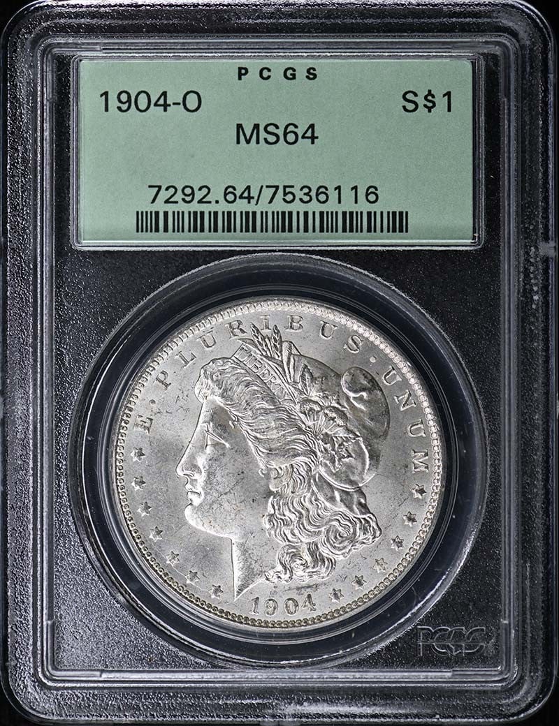 1904-O $1 Morgan Dollar PCGS MS64: 1904-O $1 Morgan Dollar PCGS MS64 The 1904-O $1 Morgan Dollar is a highly detailed and well-preserved coin, certified by PCGS as MS64. This uncirculated coin features the iconic design of the Morgan D