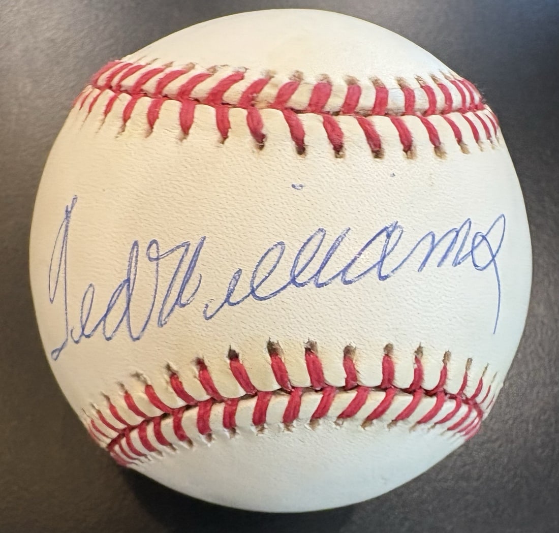 TED WILLIAMS OFFICAL AMERICAN LEAGUE SIGNED BASEBALL JSA LOA: TED WILLIAMS OFFICAL AMERICAN LEAGUE SIGNED BASEBALL JSA LOA Authentic JSA-verified signature by baseball legend Ted Williams on an official American League baseball, a rare and unique collectible