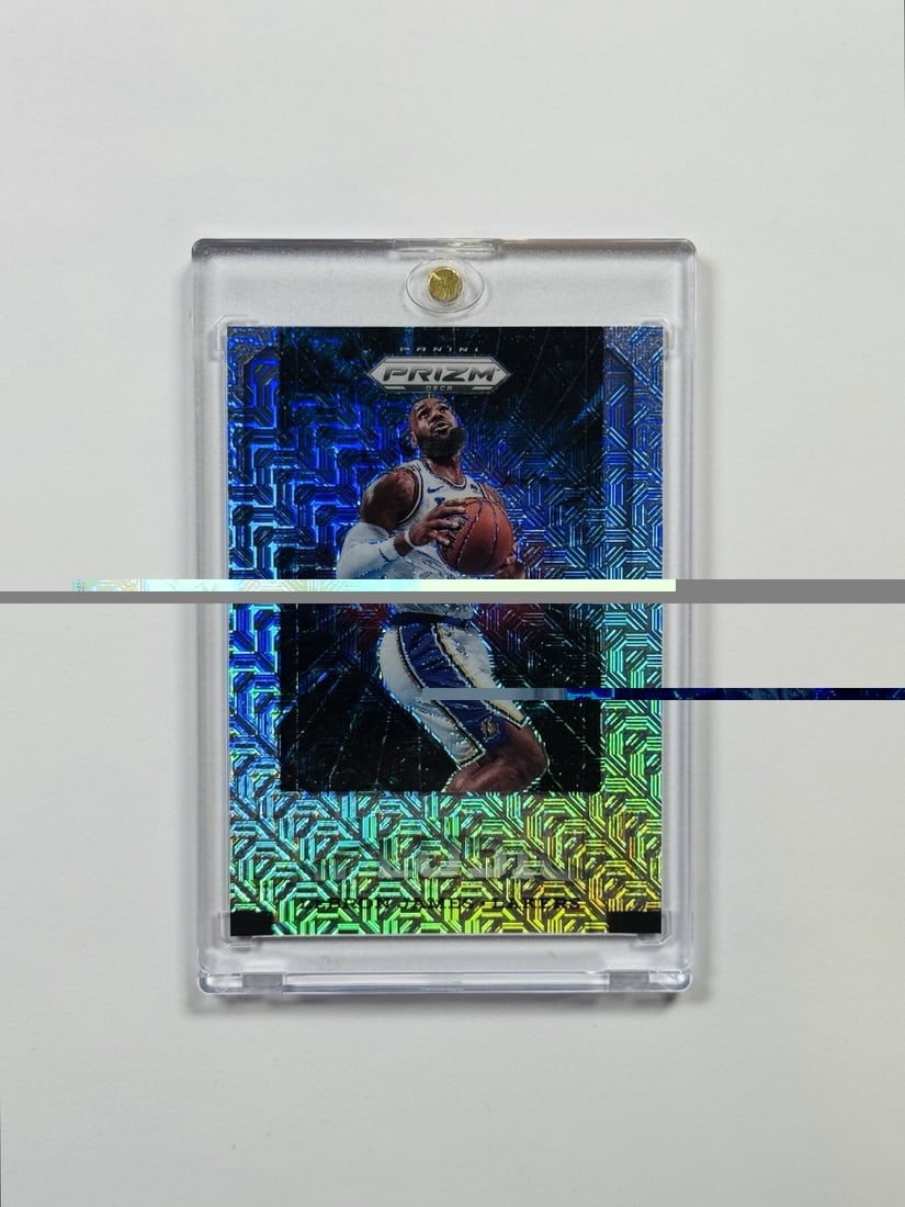 Panini Prizm Deca LeBron James Mojo #10: Panini Prizm Deca LeBron James Mojo #10 Signed by LeBron James, this Panini Prizm Deca Explosion card features the NBA superstar in a unique, high-energy design. The card is part of the 2024-25 Panini