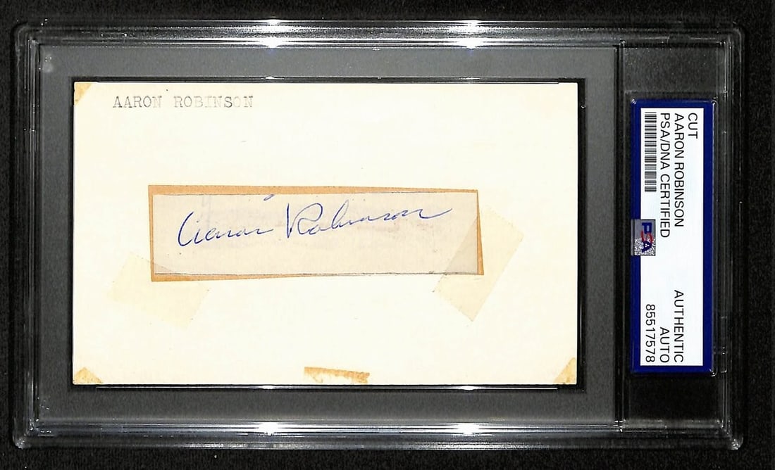 Aaron Robinson Signed/ Auto Cut on 3x5 Index Card 1947 Yankees PSA/ DNA 197005: Aaron Robinson Signed/ Auto Cut on 3x5 Index Card 1947 Yankees PSA/ DNA 197005 Aaron Robinson's 1947 Yankees auto cut on a 3x5 index card, certified by PSA and DNA, is a rare baseball relic from the l