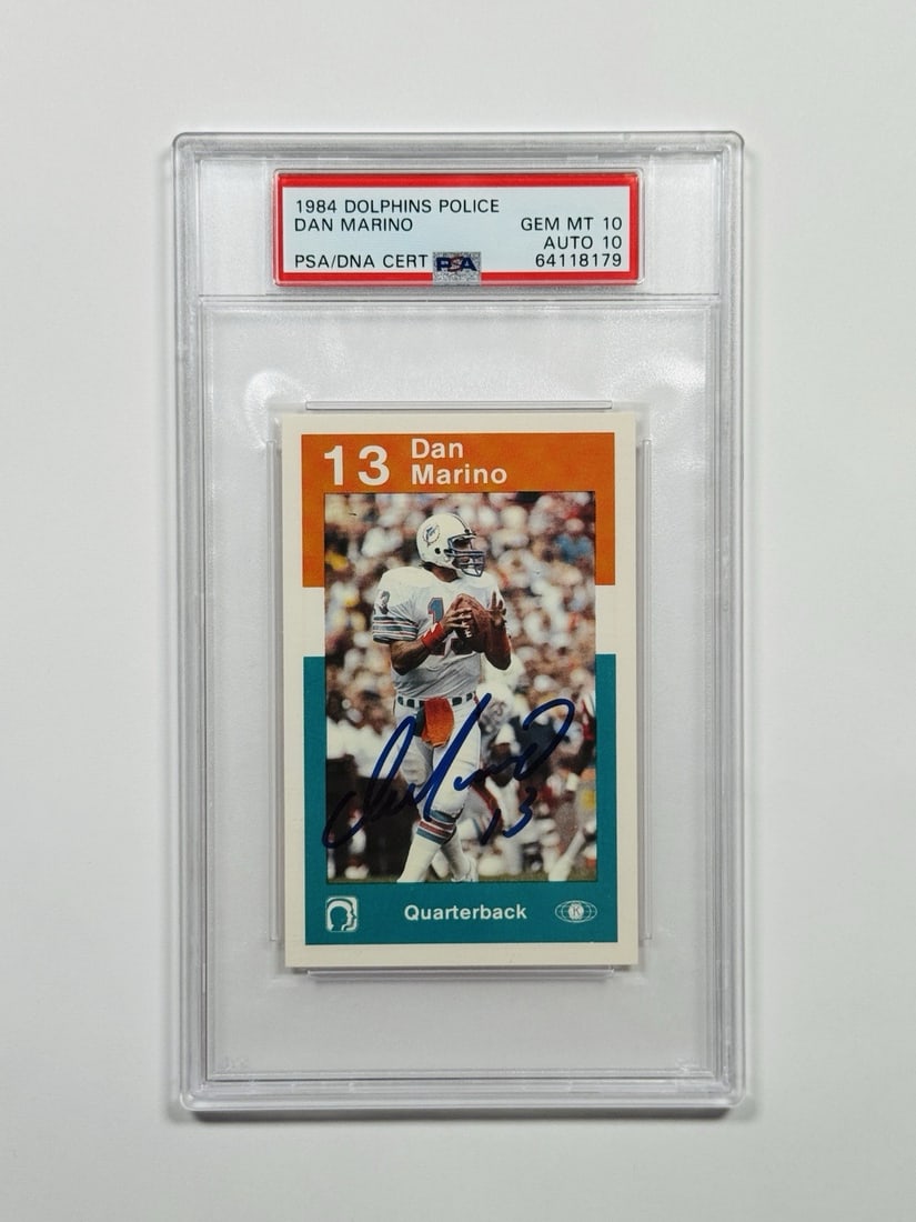 DOLPHINS POLICE DAN MARINO ROOKIE 1984 AUTO 10 PSA 10: DOLPHINS POLICE DAN MARINO ROOKIE 1984 AUTO 10 PSA 10 Dolphins Police Dan Marino Rookie 1984 Auto 10 PSA 10 is a highly graded, original 1984 National Football League (NFL) rookie card featuring Dan M