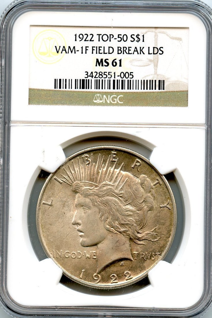 C3598- 1922 VAM-1F "FIELD BREAK" LDS TOP 50 PEACE DOLLAR NGC MS61: C3598- 1922 VAM-1F "FIELD BREAK" LDS TOP 50 PEACE DOLLAR NGC MS61 The 1922 VAM-1F "FIELD BREAK" LDS TOP 50 PEACE DOLLAR is a highly sought-after coin, featuring a unique "field break" on the top of th