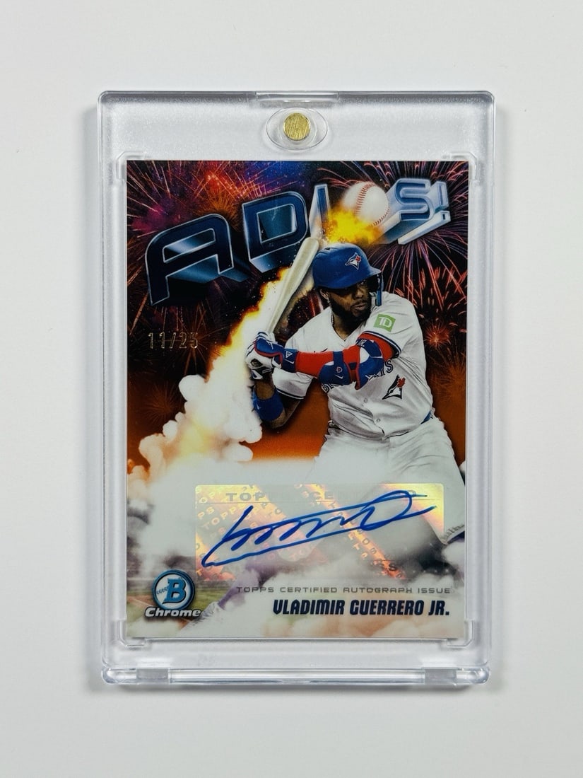 2025 BOWMAN CHROME VLADIMIR GUERRERO JR #AAV-VG ADIOS AUTO/ 25: 2025 BOWMAN CHROME VLADIMIR GUERRERO JR #AAV-VG ADIOS AUTO/ 25 Vladimir Guerrero Jr.'s 2025 Bowman Chrome Autograph card features a vibrant orange refractor background and a label print of the young s