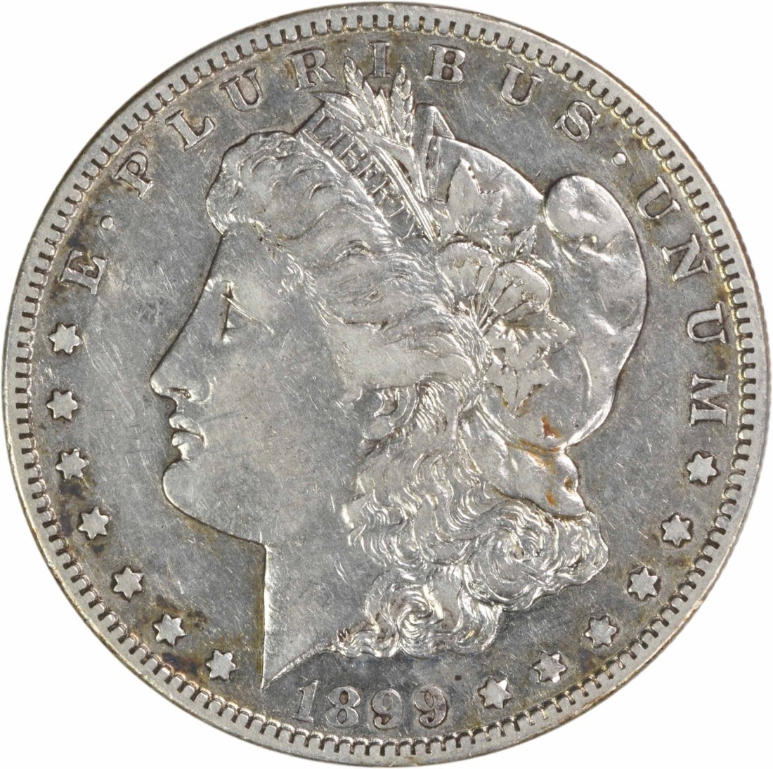 Uncertified EF Morgan Dollar 1899-S Silver: Uncertified EF Morgan Dollar 1899-S Silver The 1899-S EF Morgan Dollar is a highly detailed and intricately designed coin, featuring George T. Morgan's iconic design and a reeded edge. Made from 90% s