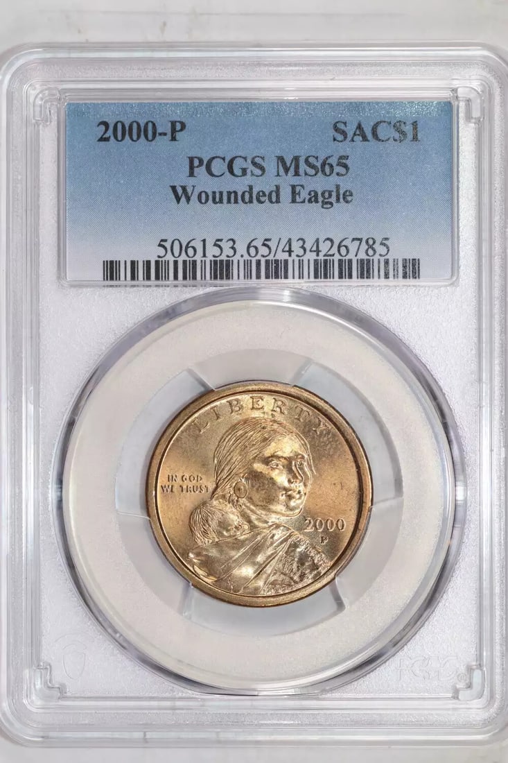 2000-P "WOUNDED EAGLE" SACAGAWEA DOLLAR PCGS MS65: 2000-P "WOUNDED EAGLE" SACAGAWEA DOLLAR PCGS MS65 The 2000-P "WOUNDED EAGLE" SACAGAWEA DOLLAR PCGS MS65 is a highly detailed and striking coin, featuring a striking design that tells the story of