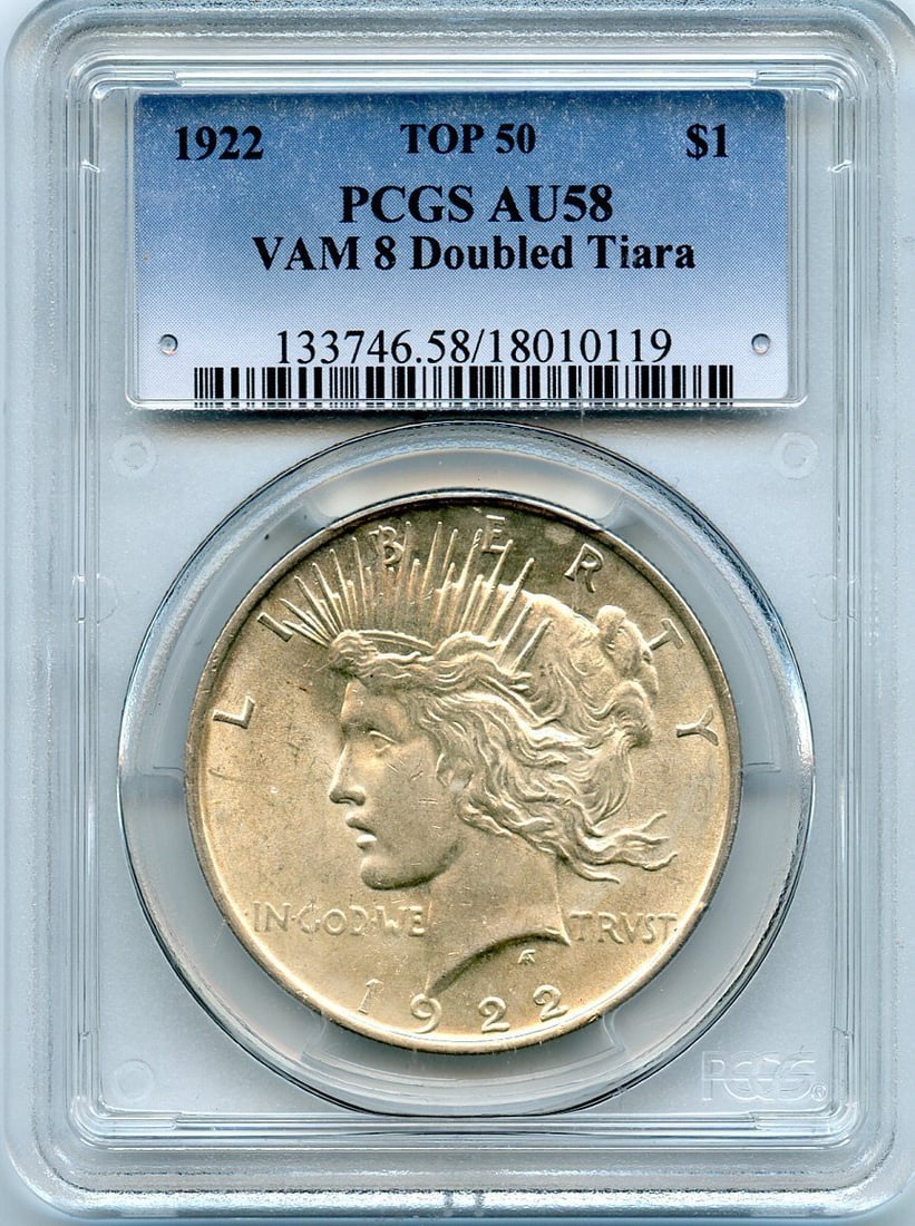 C2913- 1922 VAM-8 "DOUBLED TIARA" TOP 50 PEACE DOLLAR PCGS AU58: C2913- 1922 VAM-8 "DOUBLED TIARA" TOP 50 PEACE DOLLAR PCGS AU58 The 1922 VAM-8 "DOUBLED TIARA" Peace Dollar is a highly detailed and unique coin, featuring a distinctive doubled image of the tiara on
