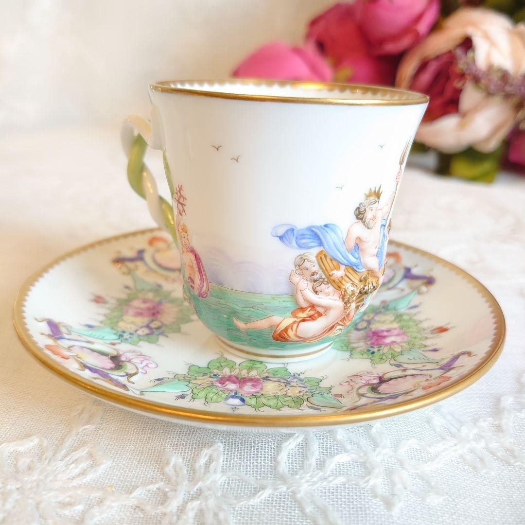 Capodimonte Relief Hand Painted Porcelain Cup Saucer Set: Capodimonte Relief Hand Painted Porcelain Cup Saucer Set Item Specifics: Origin: NA Number Of Items In Set: NA Shape: NA Signed By: NA Occasion: NA Keeps Cold For: NA Vintage: NA Keeps Hot For: NA Car