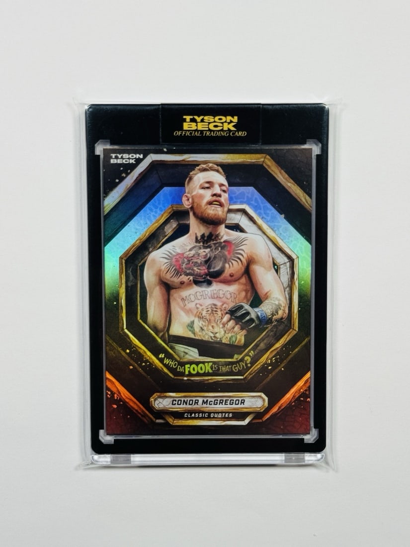 2026 CONOR MCGREGOR X TYSON BECK CLASSIC QUOTES RAINBOW FOIL/ 25: 2026 CONOR MCGREGOR X TYSON BECK CLASSIC QUOTES RAINBOW FOIL/ 25 Standard Autographed Conor McGregor x Tyson Beck Rainbow Foil Trading Card. This 2026 print is part of a limited edition /25 series, ma